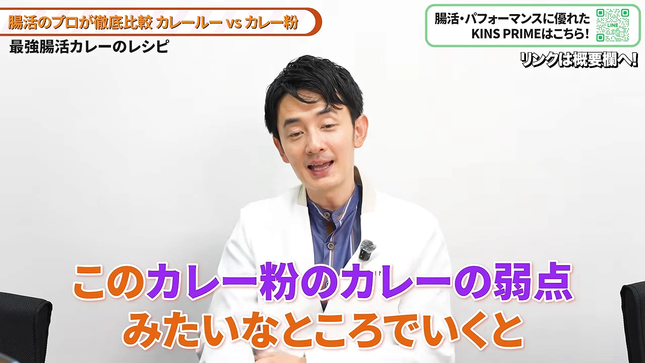 白衣を着た男性が身振り手振りを交えながら語っています。