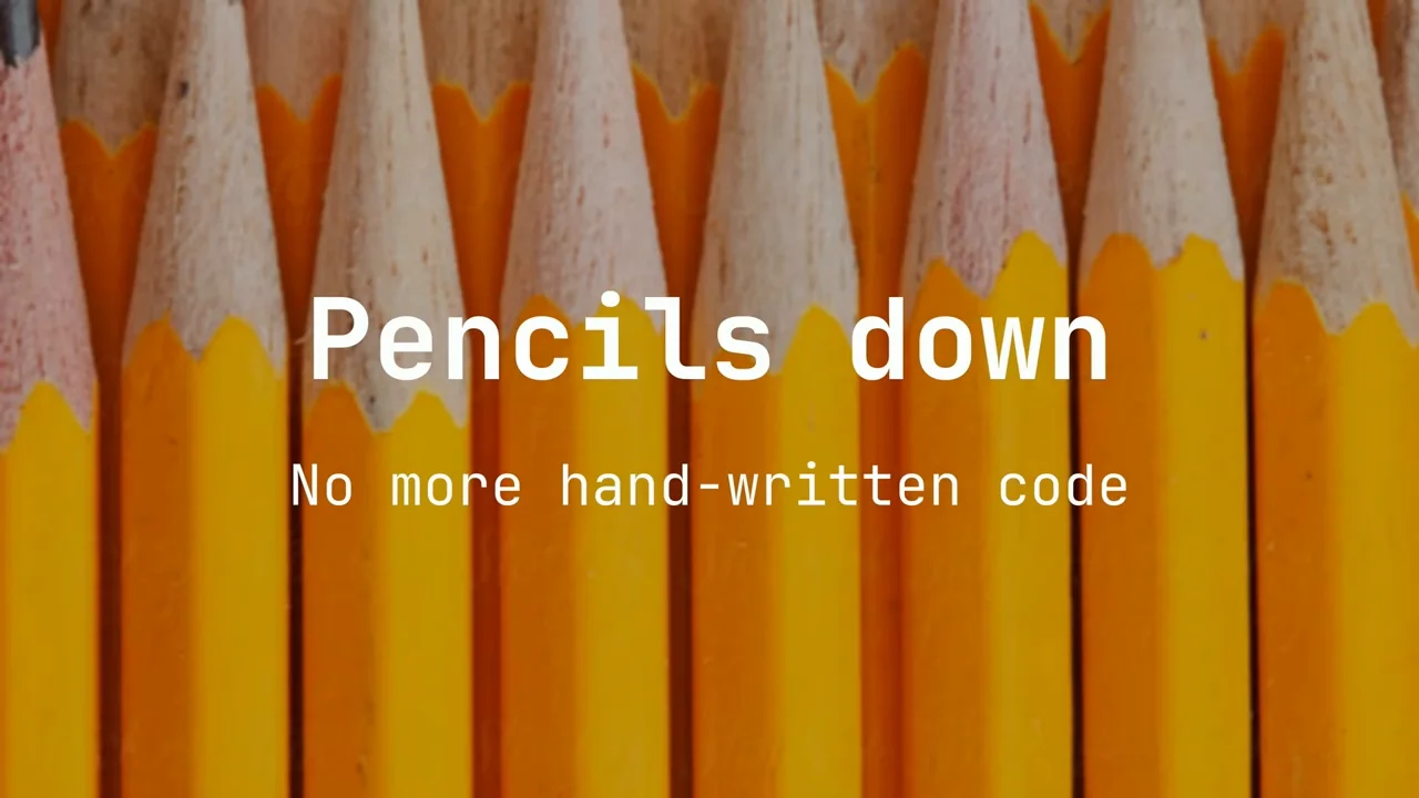 並べられた黄色い鉛筆を背景に、「Pencils down」および「No more hand-written code」というテキストが表示されています。